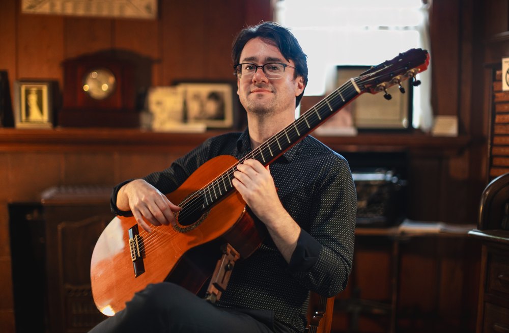 Yuri Liberzon — Portrait with guitar