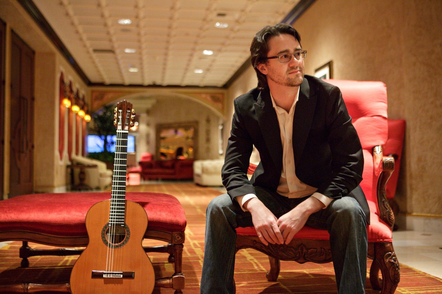Yuri Liberzon — Seated, with guitar
